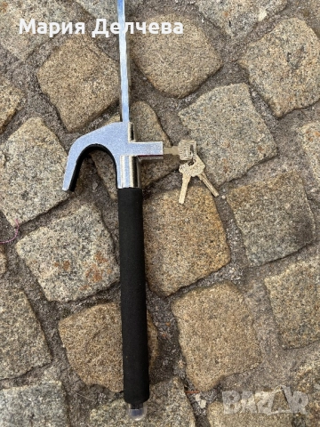 Заключващ механизъм за кормило на кола