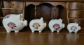Комплект от четири порцеланови прасенца касички, снимка 1