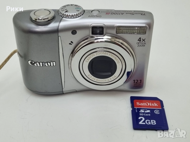 Canon PowerShot A1100 IS 12.1 MP 4x Zoom Digital Camera-Silver , снимка 2 - Фотоапарати - 52729570