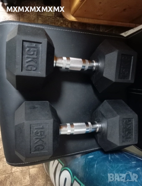 Продавам Дъмбели по 15 кг всяка общо 30кг , снимка 1