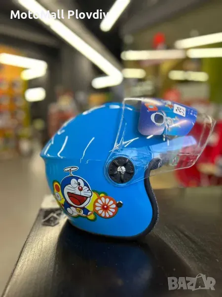 Ново! Детска скутерска каска различни разцветки с визьор добра изработка , снимка 1