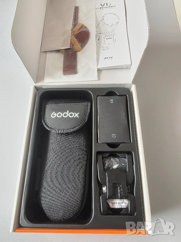 Светкавица GODOX V1Pro-O за Olympus / Panasonic, снимка 12 - Светкавици, студийно осветление - 52219238