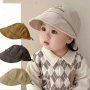 Удобна детска шапка с козирка от мека материя, снимка 1 - Шапки, шалове и ръкавици - 44459681
