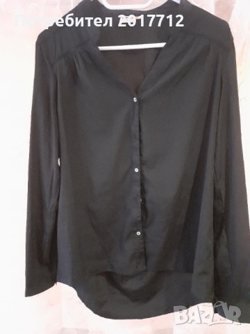 Продавам черна дамска риза.Размер 38
