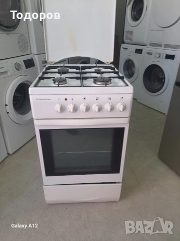 Готварска печка с котлони на газ и фурна на с вентилатор , снимка 1