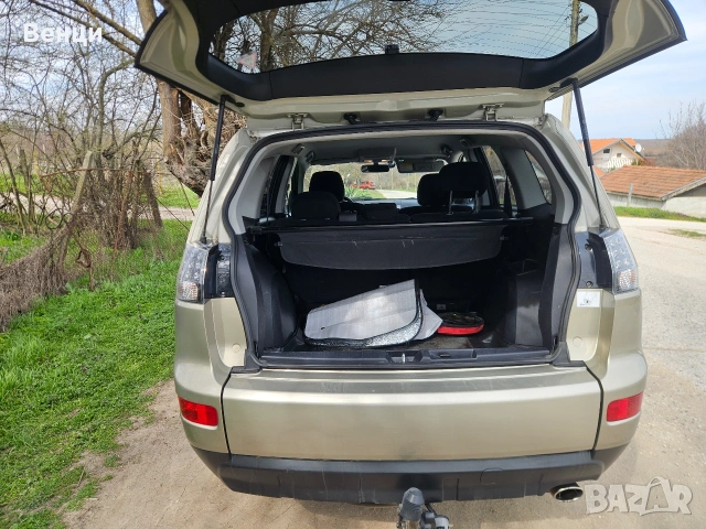 Mitsubishi Outlander 2.4 газ/бензин 150 к.с., снимка 9 - Автомобили и джипове - 54012564