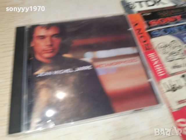 JEAN MICHEL JARRE CD 0202261010, снимка 10 - CD дискове - 53314054