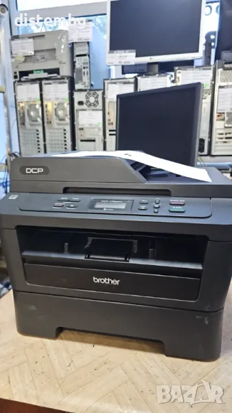 Лазерно мултифункционално устройство Brother DCP-7065DN, снимка 1