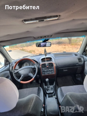 Mitsibishi Carisma, снимка 10 - Автомобили и джипове - 54252303