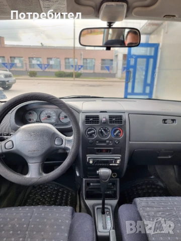 Daihatsu Sirion, снимка 13 - Автомобили и джипове - 54244160