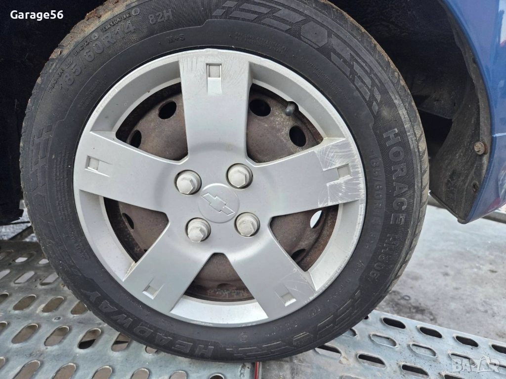 Джанти с гуми и тасове за Chevrolet Aveo 14 цола , снимка 1