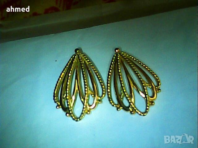 красиви pozlatani брасли е обеци