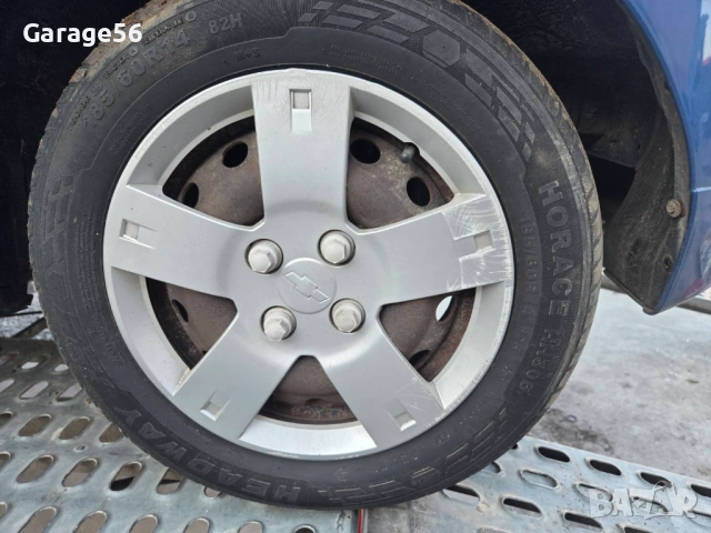 Джанти с гуми и тасове за Chevrolet Aveo 14 цола 