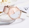 Страхотен нов двуцветен дамски часовник с кожена каишка в бял и бежов цвят., снимка 1 - Дамски - 42598278