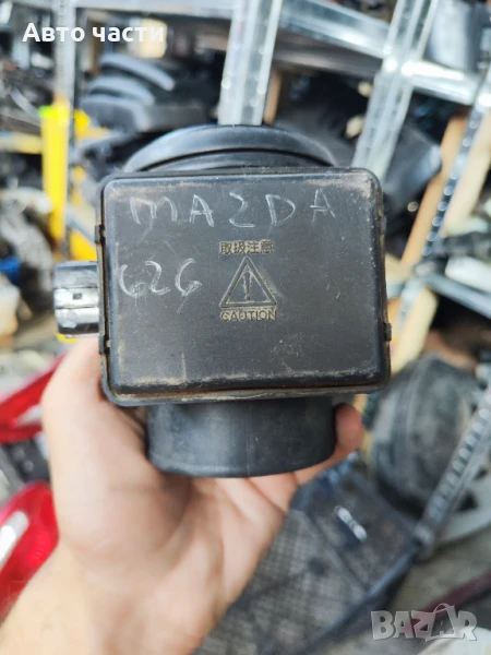 Дебитомер за въздух B577 E5T51071 Mazda, снимка 1