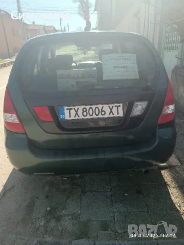 Suzuki Liana, снимка 4 - Автомобили и джипове - 49439620