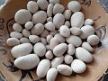 малки кръгли бели камъчета от Егейско море, от остров Парос