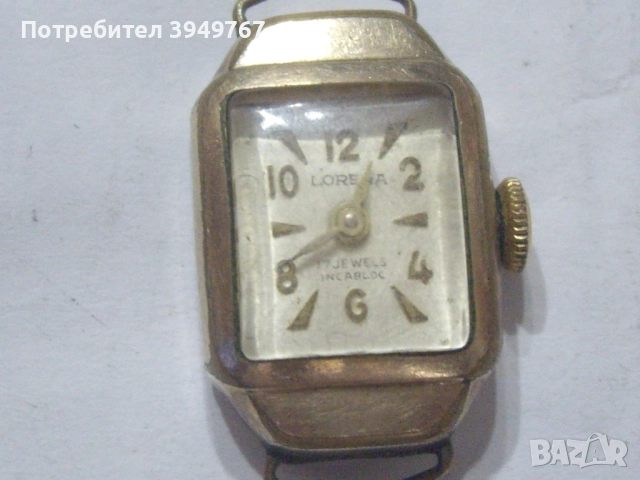 Позлатен,дамски часовник.