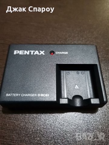 Оригинално зарядно Pentax D-BC63 за батерии Pentax D-Li63, снимка 1 - Батерии, зарядни - 32138318