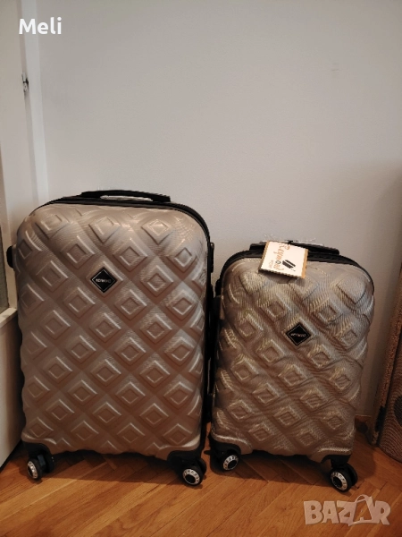 нови куфари на Reymond , снимка 1