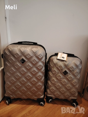 нови куфари на Reymond 