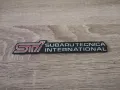 Subaru STI емблема черно с червено, снимка 1