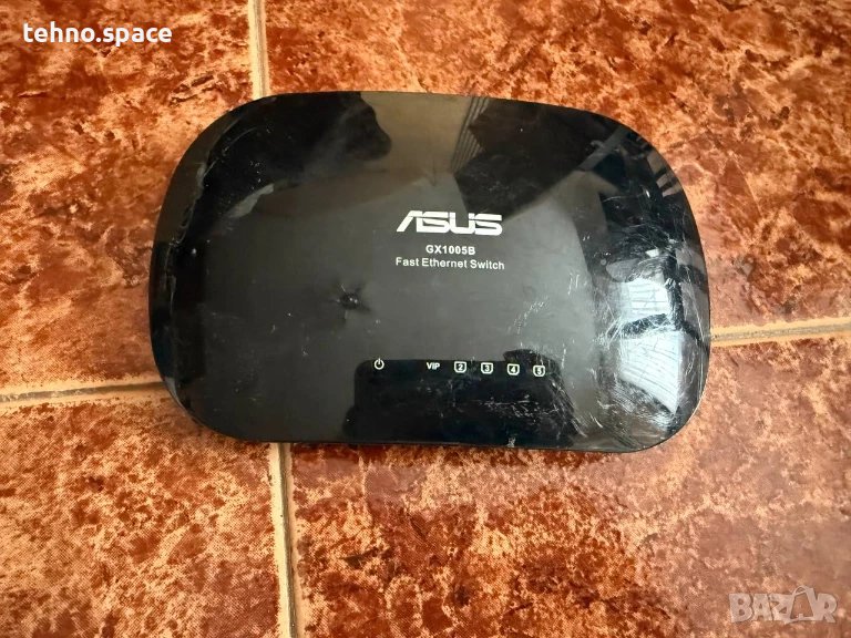 Asus GX1005B v5 Ethernet Switch, снимка 1