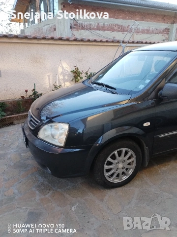 Кия Каренс-бензин-газ, снимка 14 - Автомобили и джипове - 53292627