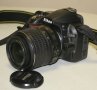 Фотоапарат Nikon D3100 с обектив Nikkor AF-S 18-55 VR, снимка 1 - Фотоапарати - 42630790