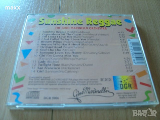 CD диск The Gino Marinello Orchestra – Sunshine reggae , 1991, снимка 3 - CD дискове - 29134871