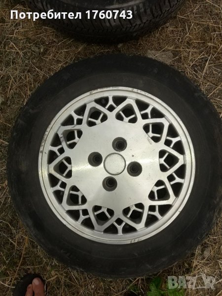 2 бр. Лети джанти 14 ц.4/100 центр отвор 61ммРЕНО Оригинални с гуми  DEBICA  185/65 /14, снимка 1