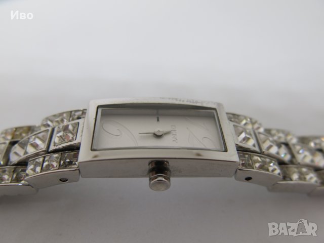 Дамски часовник с кристали DKNY NY3971, снимка 11 - Дамски - 44371930