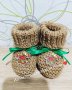 Ръчно плетени Коледни терлички , снимка 1 - Бебешки чорапи - 38783078
