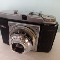 Фотоапарат Dacora Digna
.1956г., снимка 2 - Антикварни и старинни предмети - 44595378