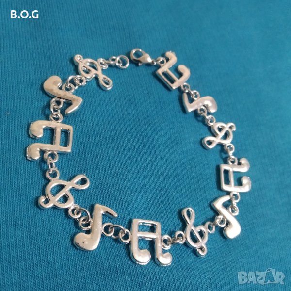 Нова, сребърна масивна гривна с ноти. В подаръчна кутия., снимка 1