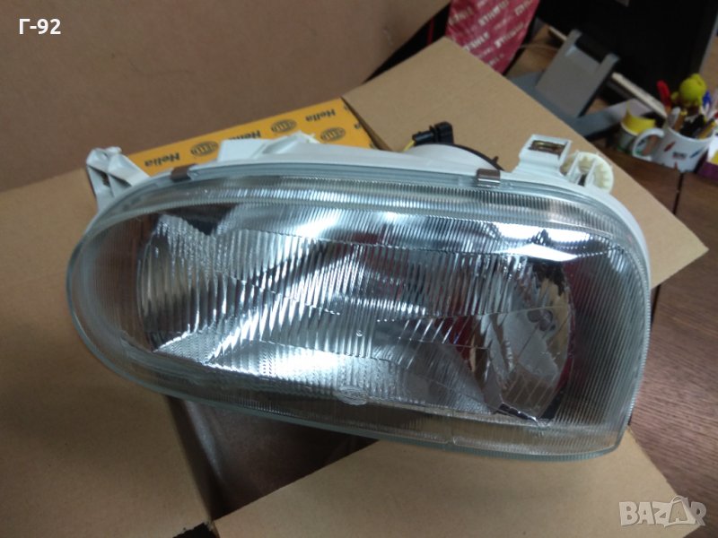 1AJ007235271**НОВО**HELLA*Фар,ляв, VW GOLF III CL 03.92-12.95, снимка 1