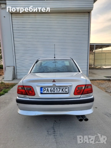 Mitsibishi Carisma, снимка 12 - Автомобили и джипове - 54252303