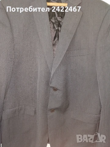 Мъжко елегантно тъмно сиво сако DKNY.120 см гръдна обиколка.От рамо до рамо 50см