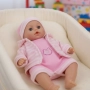 Кукла бебе с мигащи очички и зимни дрехи - Идеалният подарък за вашето дете, снимка 7