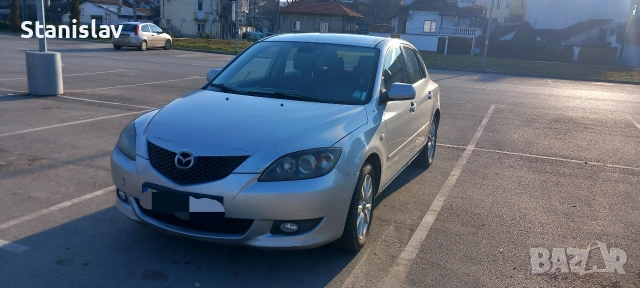 Мазда 3