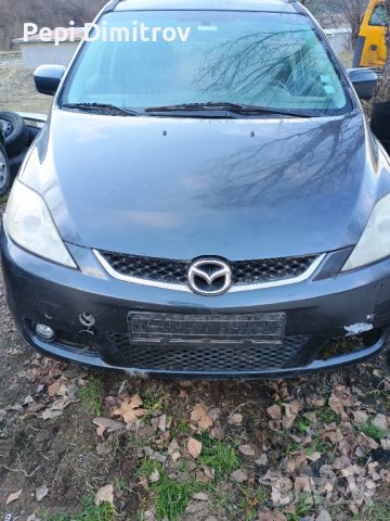 Мазда 5 на части 