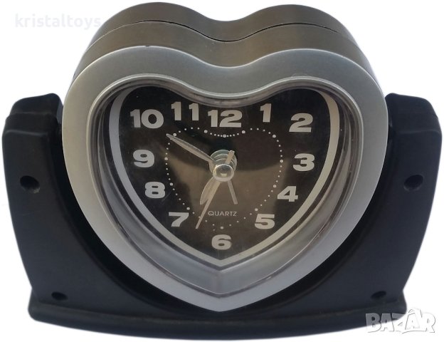 Часовник с подвижно тяло с форма на сърце