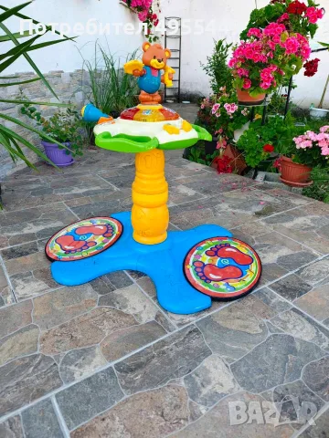 детска играчка VTech Sit-to-Stand Dancing Tower (Танцуваща кула „Седни и стани“).