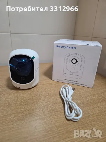 COCOCAM 2K Wireless Rechargeable Security Camera (модел ZY-C7), която се отличава с компактен бял 