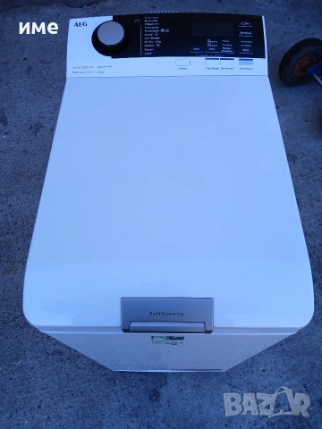 Пералня със горно зареждане AEG Serie 7000