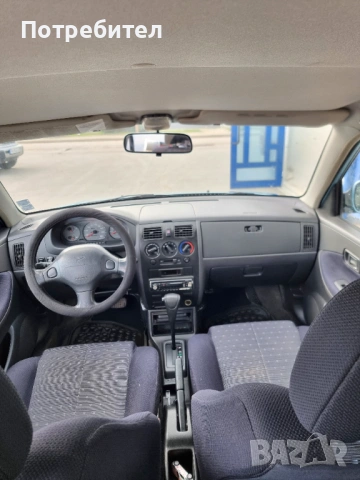 Daihatsu Sirion Автоматик, снимка 14 - Автомобили и джипове - 54252284