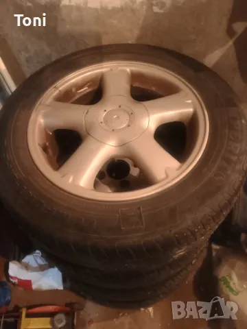 алуминиеви джанти 15ки от Нисан Алмера 4_114,3, снимка 6 - Гуми и джанти - 49861585