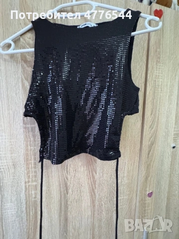 Къс черен потник