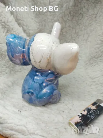 Порцеланова статуетка танцуващо слонче