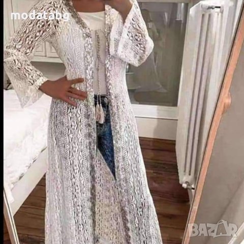 РАЗПРОДАЖБА НА БАНСКИ И ПЛАЖНО ОБЛЕКЛО Плажно парео в бял и черен цвят 